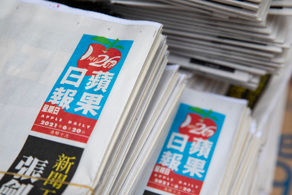 Readers Buy Copies of the Apple Daily on Its 26th Anniversary