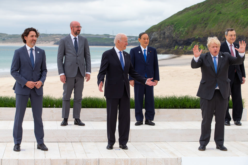 Canadian Prime Minister Justin Trudeau, President of the European Council Charles Michel, US President Joe Biden, Japanese Prime Minister Yoshihide Suga, British Prime Minister Boris Johnson and Italian Prime Minister Mario Draghi pose for the Leaders official welcome and family photo during the G7 Summit In Carbis Bay, on June 11, 2021 in Carbis Bay, Cornwall. (Jonny Weeks—WPA Pool / Getty Images))