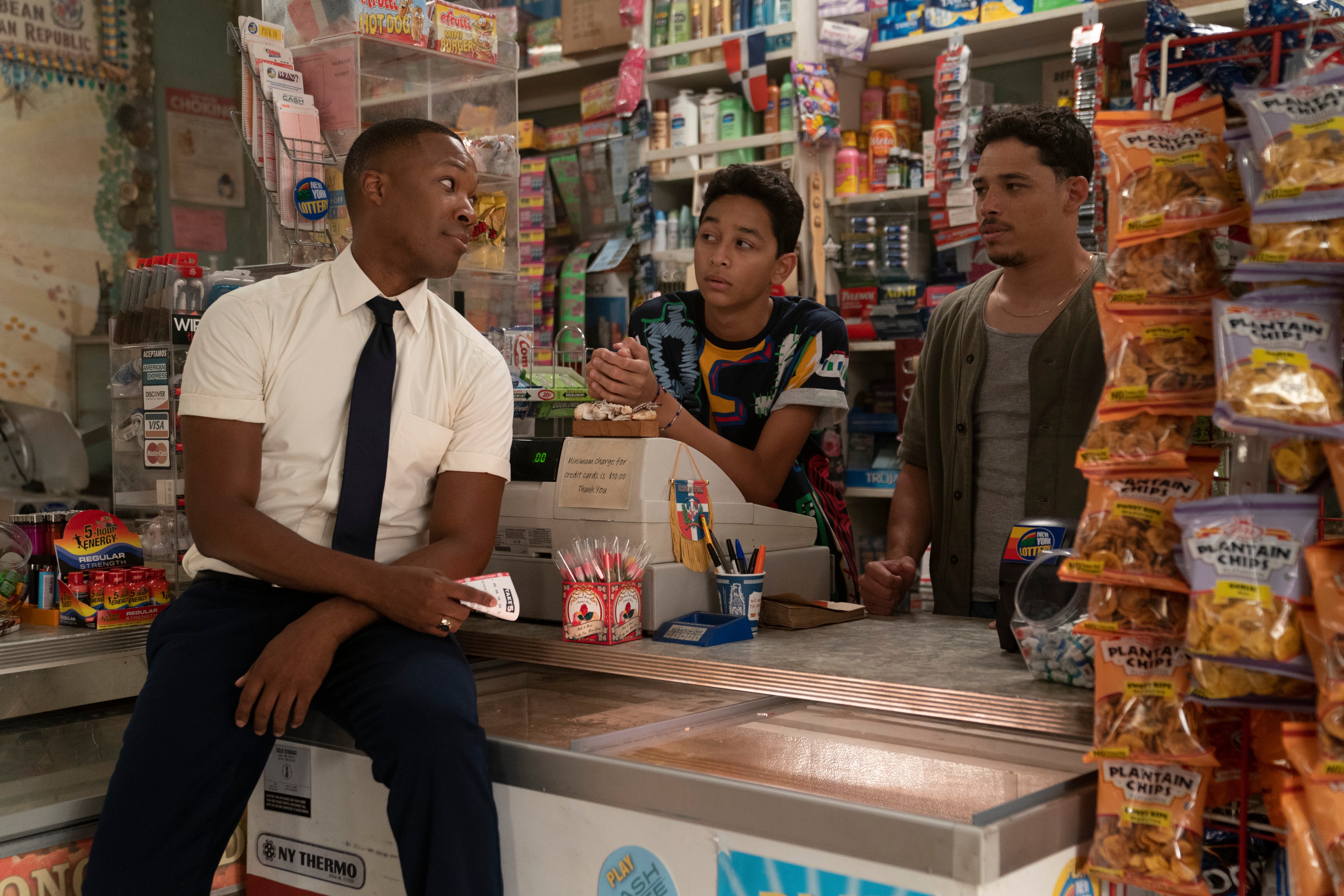 Anthony Ramos (right) in his bodega with Benny (Corey Hawkins) and Sonny (Gregory Diaz IV) (Macall Polay © 2019 Warner Bros. Entertainment Inc. All Rights Reserved)