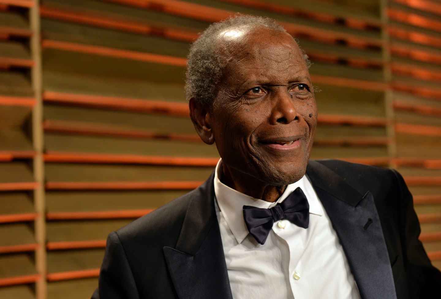 Sidney Poitier attends a Vanity Fair Oscar Party, 2014. (Larry Busacca — Getty Images)