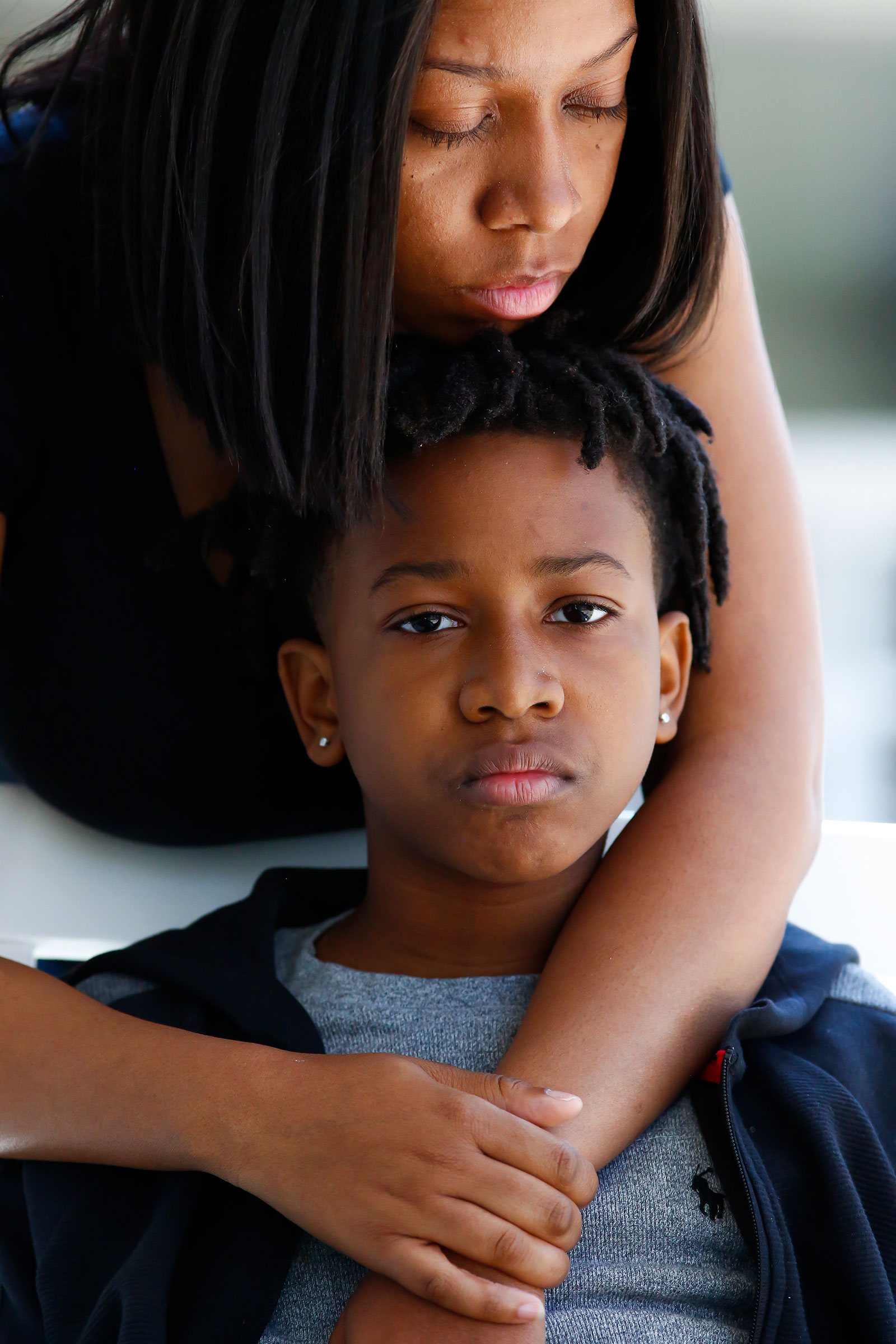 Ashley Martin, Franklin’s ex-girlfriend, and their 13-year-old son Nehemiah (Kevin Mohatt for TIME)