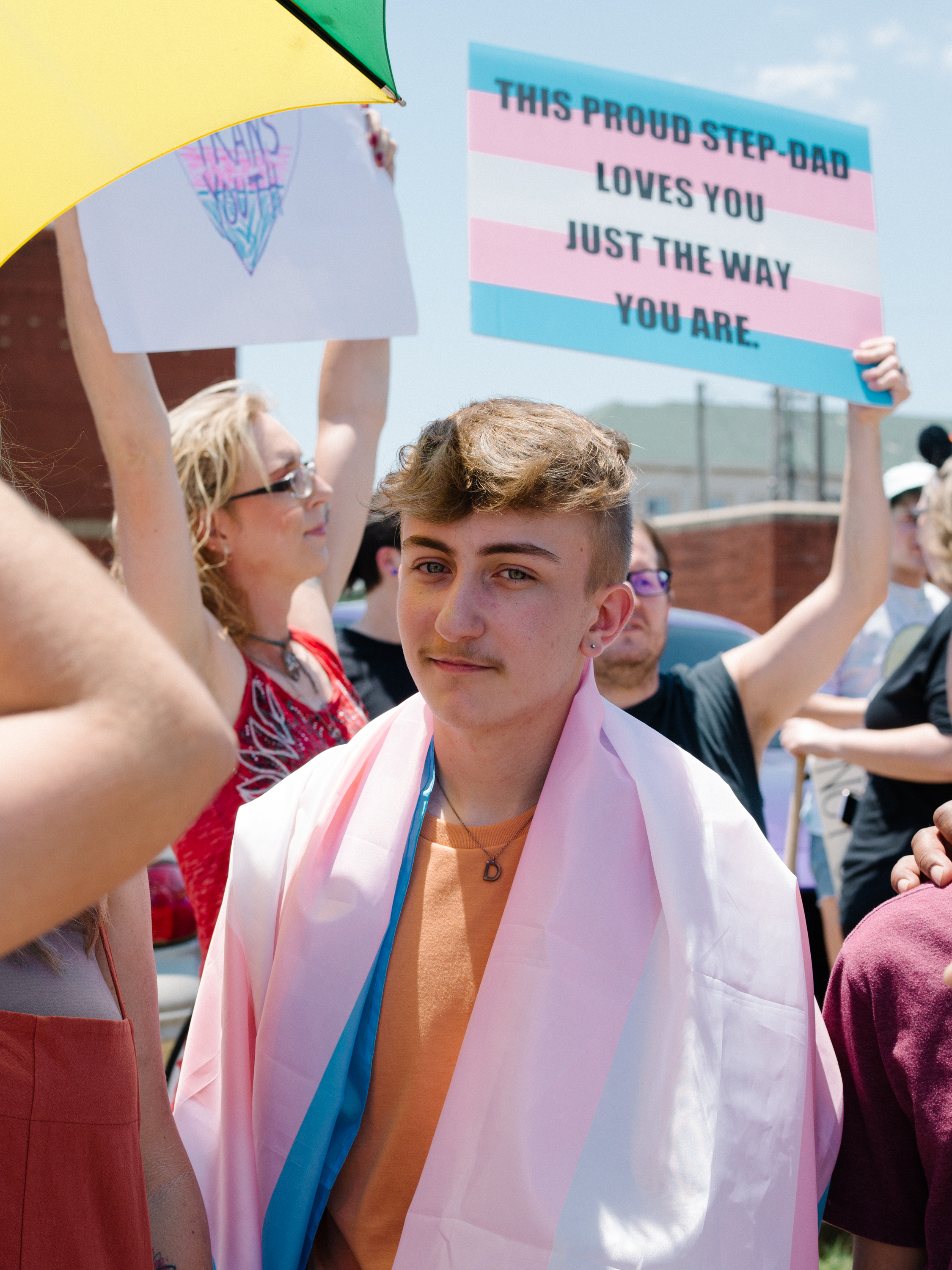 Fifteen-year-old Dylan Brandt, one of the four trans children represented in the ACLU's lawsuit, at a protest earlier this year. (Courtesy of the ACLU/Rana Young)