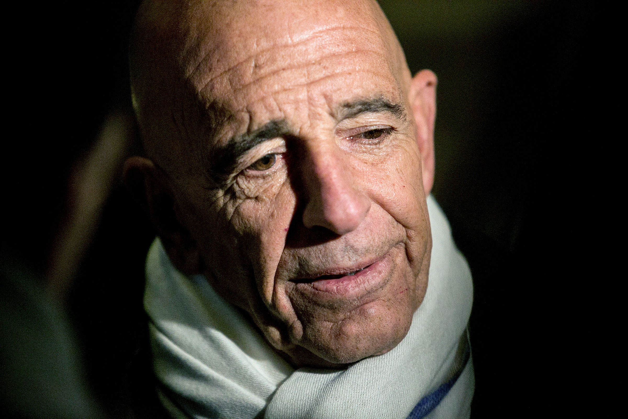 Thomas Barrack, then-chairman of President Donald Trump's inaugural committee, talks to reporters in the lobby of Trump Tower in New York on Jan. 10, 2017. (Sam Hodgson—The New York Times/Redux)