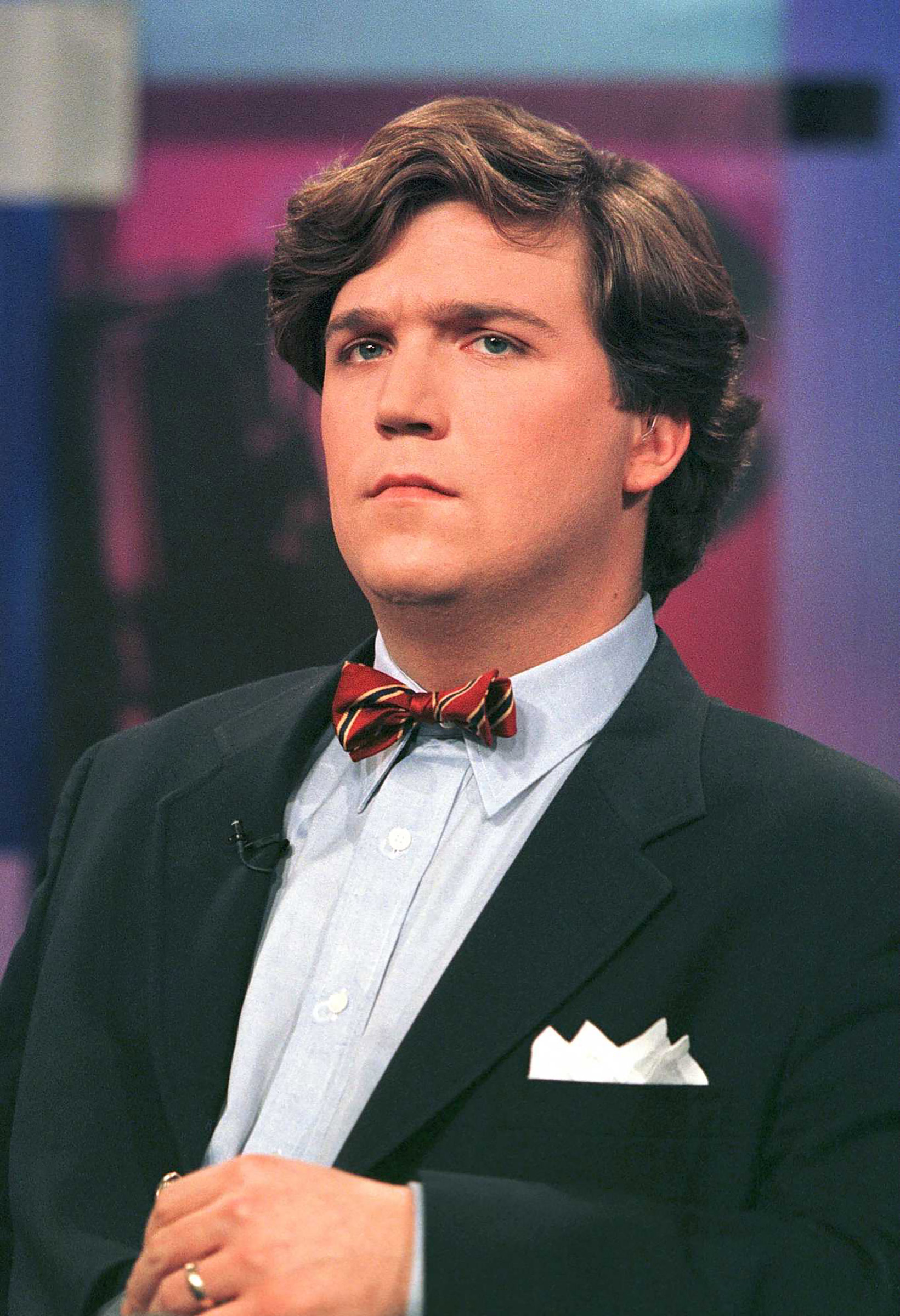 Early in his career as a writer during the 1990's Carlson was known for always wearing a bow tie. (Richard Ellis—Getty Images)