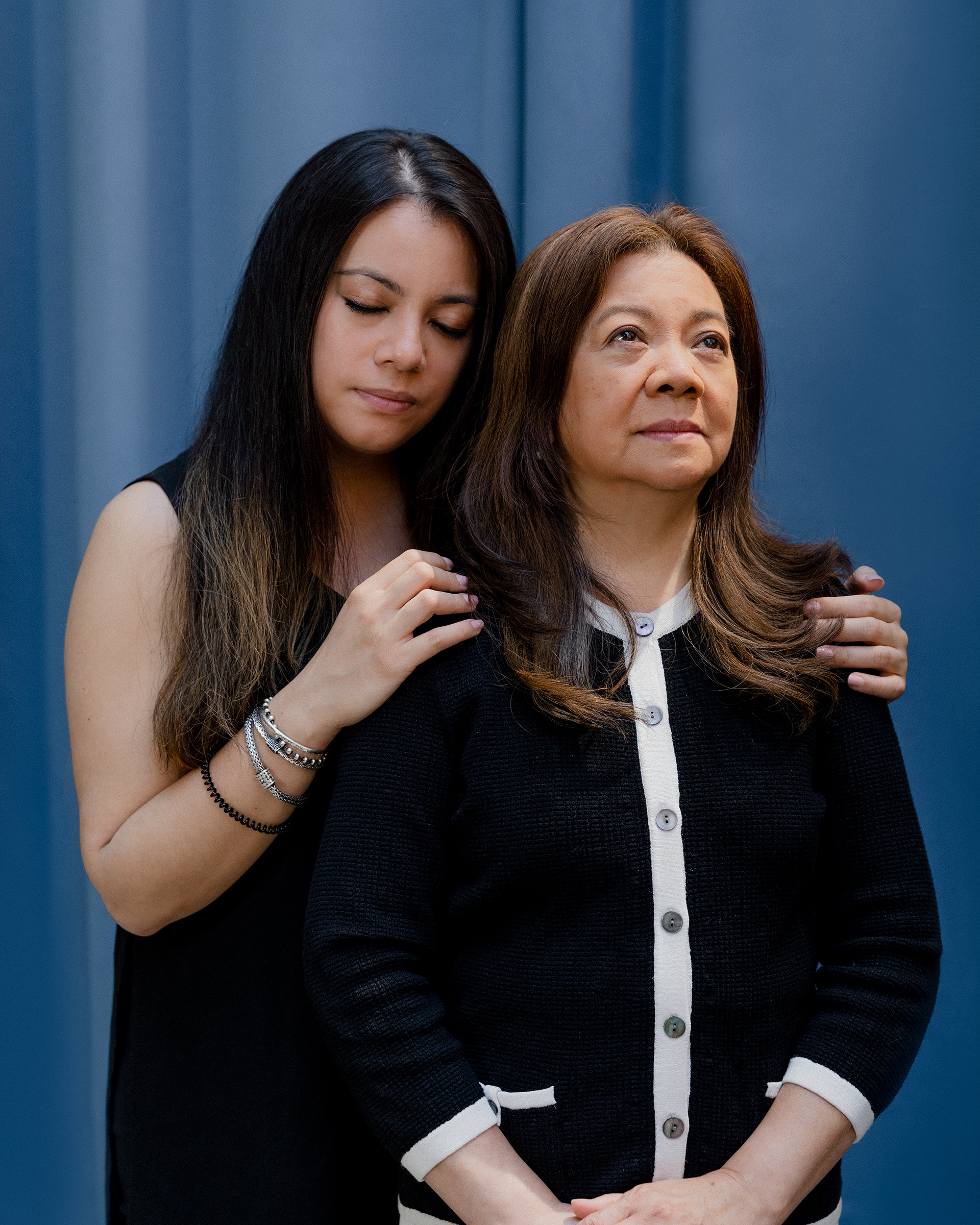 Elizabeth Kari, 32, closes her eyes as she holds her mother Vilma Kari, 66, inside her lower-Manhattan apartment building on May 21. It’s a rare moment of rest for Elizabeth, who took a two-month leave from her fashion-industry job to be her mother’s caretaker after Vilma was brutally attacked. On March 29, while she was walking to church, a man kicked her to the ground, stomped on her face and shouted, “You don’t belong here!” Because Vilma suffered serious injuries including a fractured pelvis, Elizabeth, her only child, moved her mother into her home and had to help her with basic tasks like sitting up, using the bathroom, even slowly adjusting her legs, inch by inch, to find less painful positions. “The first week, every movement she made was with me,” says Elizabeth, who also assumed the role of her mother’s emotional bodyguard, initially shielding her from any news coverage of the high-profile attack, which Vilma is still processing. “This, I feel, is the scariest time for me to be an Asian,” says Vilma, who moved to the U.S. from the Philippines nearly 40 years ago. “I never felt that before.” In May, Elizabeth created a campaign called AAP(I belong) in her mother’s honor to allow people who have encountered anti-Asian hate to anonymously share their stories online—and to subvert the attacker’s racist phrase. “I don't think it’s anyone’s right to tell anyone they don’t belong in America. That’s the cornerstone of what America is,” Elizabeth says. “And that’s what makes America so beautiful.”