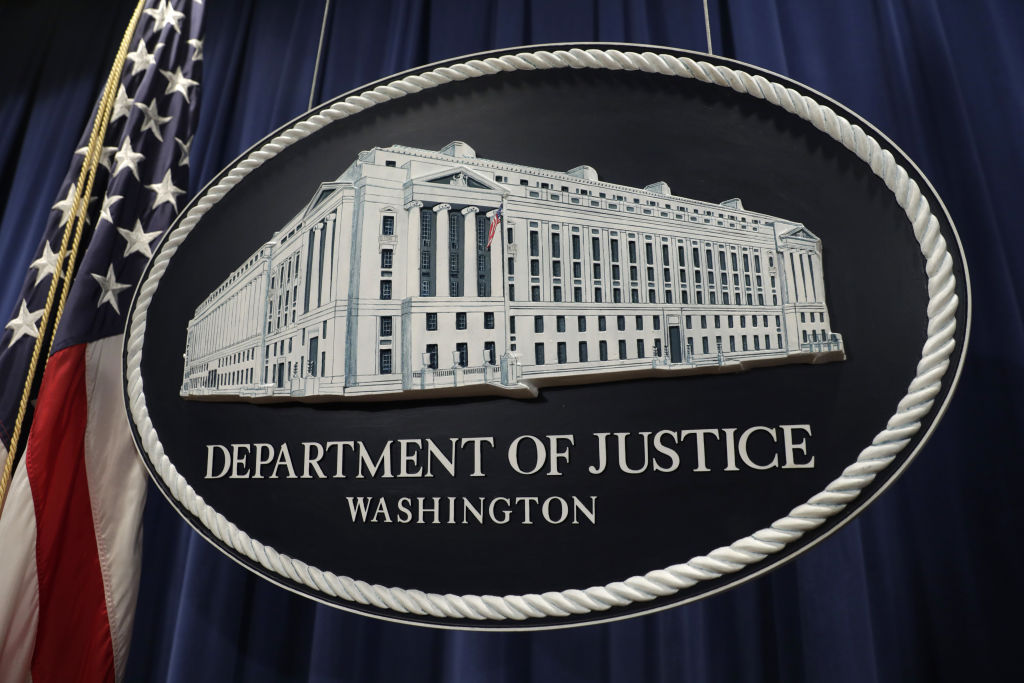 The U.S. Department of Justice seal is displayed in Washington, D.C., U.S. on Dec. 20, 2018. (Yuri Gripas—Bloomberg/Getty Images)