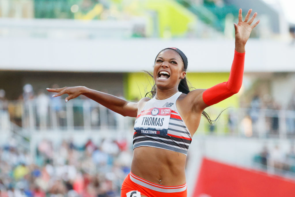 Gabby Thomas celebrates after crossing the finish line to win the Women's 200-m Final on day nine of the 2020 U.S. Olympic Track & Field Team Trials at Hayward Field on June 26, 2021 in Eugene, Oregon. (Steph Chambers—Getty Images)