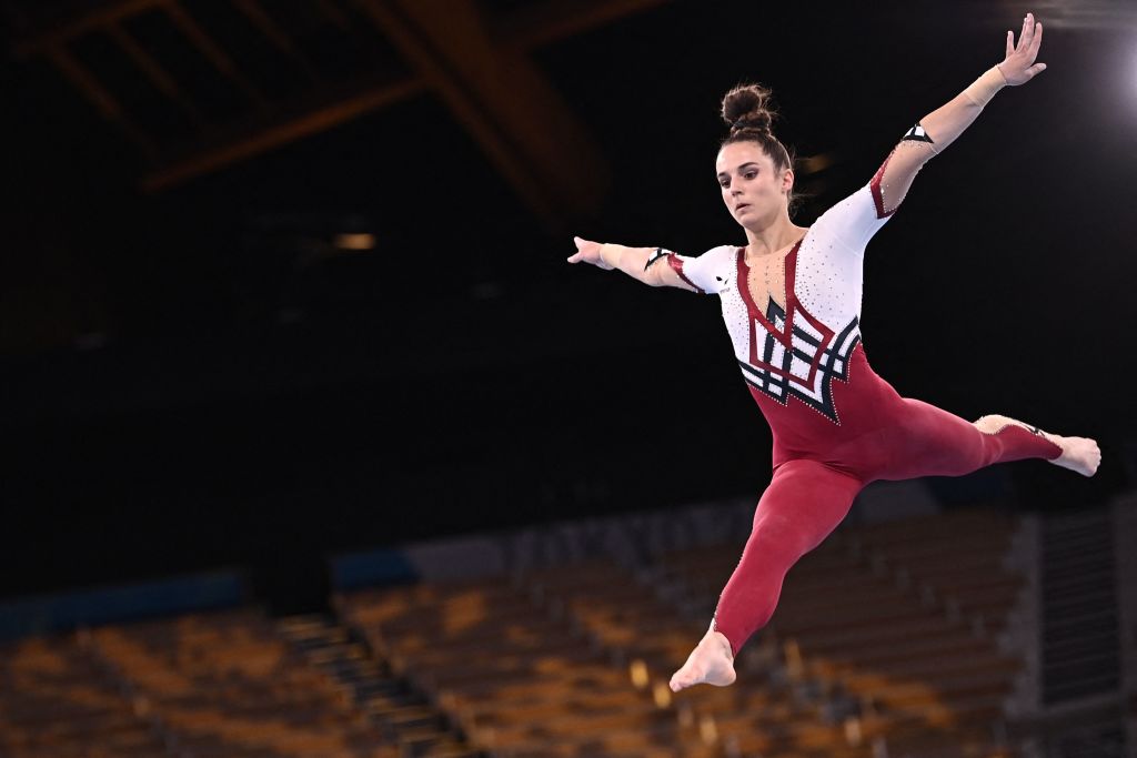 Germany's Pauline Schaefer-Betz competes in the artistic gymnastics balance beam event of the women's qualification during the Tokyo 2020 Olympic Games at the Ariake Gymnastics Centre in Tokyo on July 25, 2021. (Lionel Bonaventure—AFP via Getty Images)