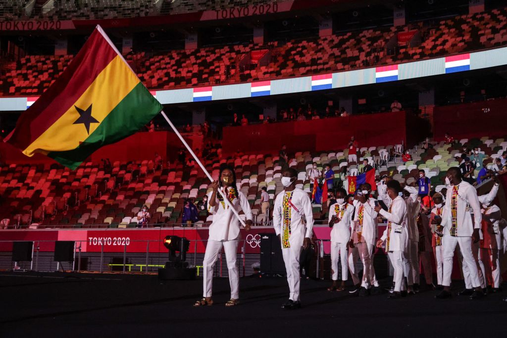 Ghana's flag bearer Nadia Eke leads the delegation during the Tokyo 2020 Olympic Games opening ceremony's parade of athletes, at the Olympic Stadium in Tokyo on July 23, 2021. (Hannah McKay—AFP via Getty Images)