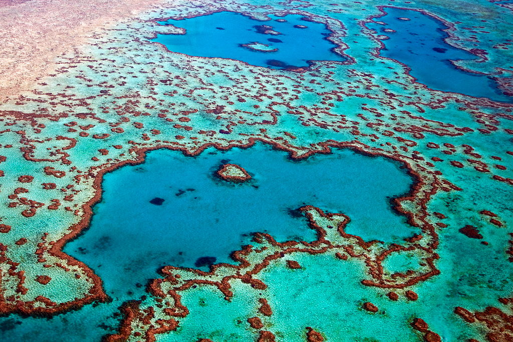 Aerial view of heart-shaped Heart Reef, part of the Great Barrier Reef of the Whitsundays in the Coral sea, Queensland, Australia. (Arterra/Universal Images Group/Getty Images)