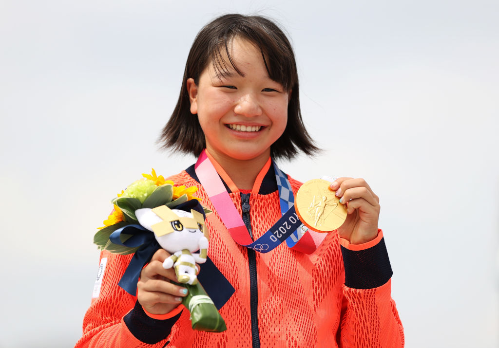 Momiji Nishiya of Team Japan poses with her gold medal during the Women's Street Final medal ceremony on day three of the Tokyo 2020 Olympic Games at Ariake Urban Sports Park on July 26, 2021 in Tokyo, Japan. (Patrick Smith—Getty Images)