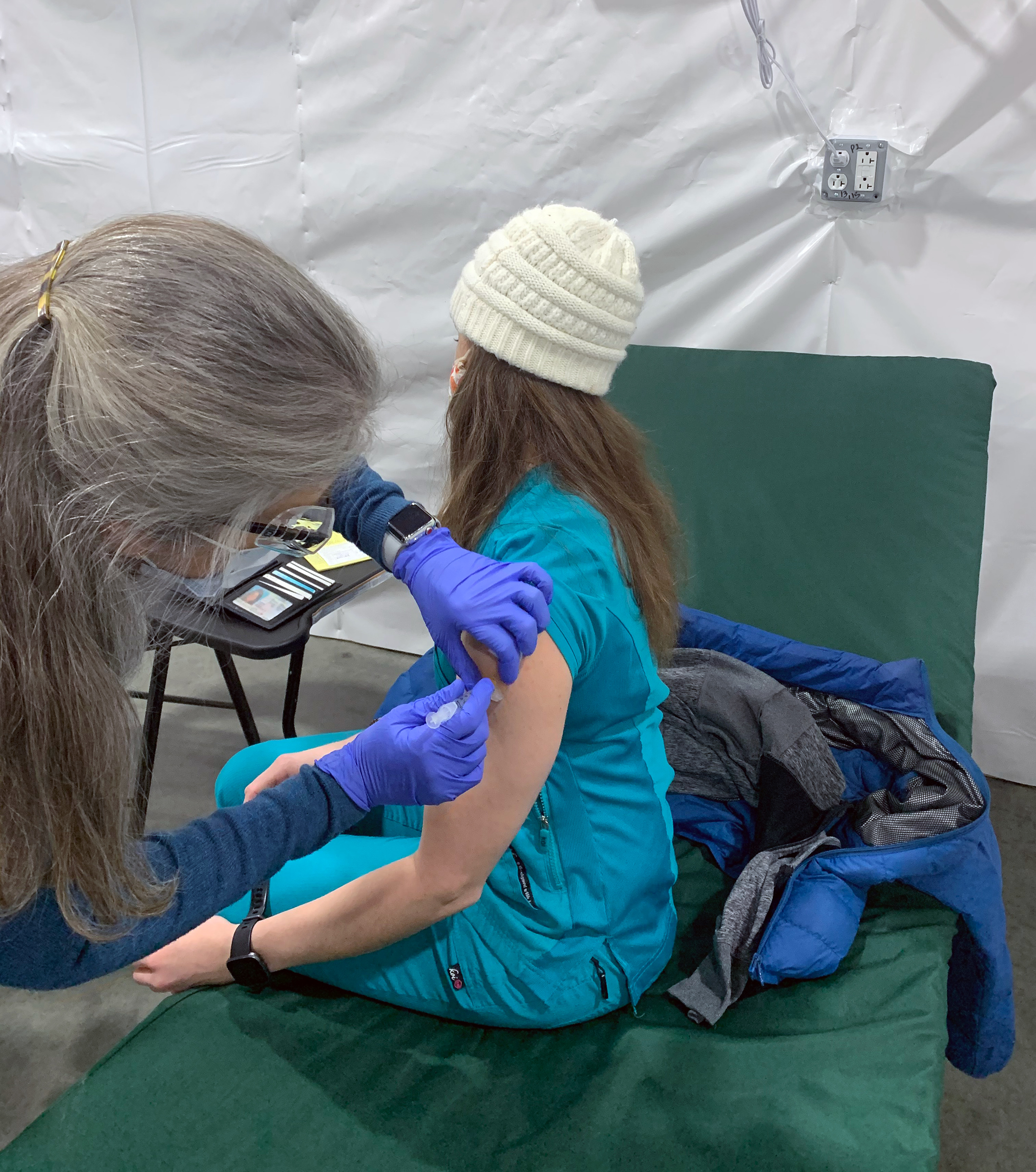 Nurse McKale Santin receives her Covid-19 vaccination. (Courtesy McKale Santin)