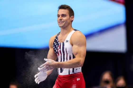 Sam Mikulak prepares to compete on the parallel bars during day 1 of the Men's 2021 U.S. Olympic Trials in St Louis on June 24, 2021.