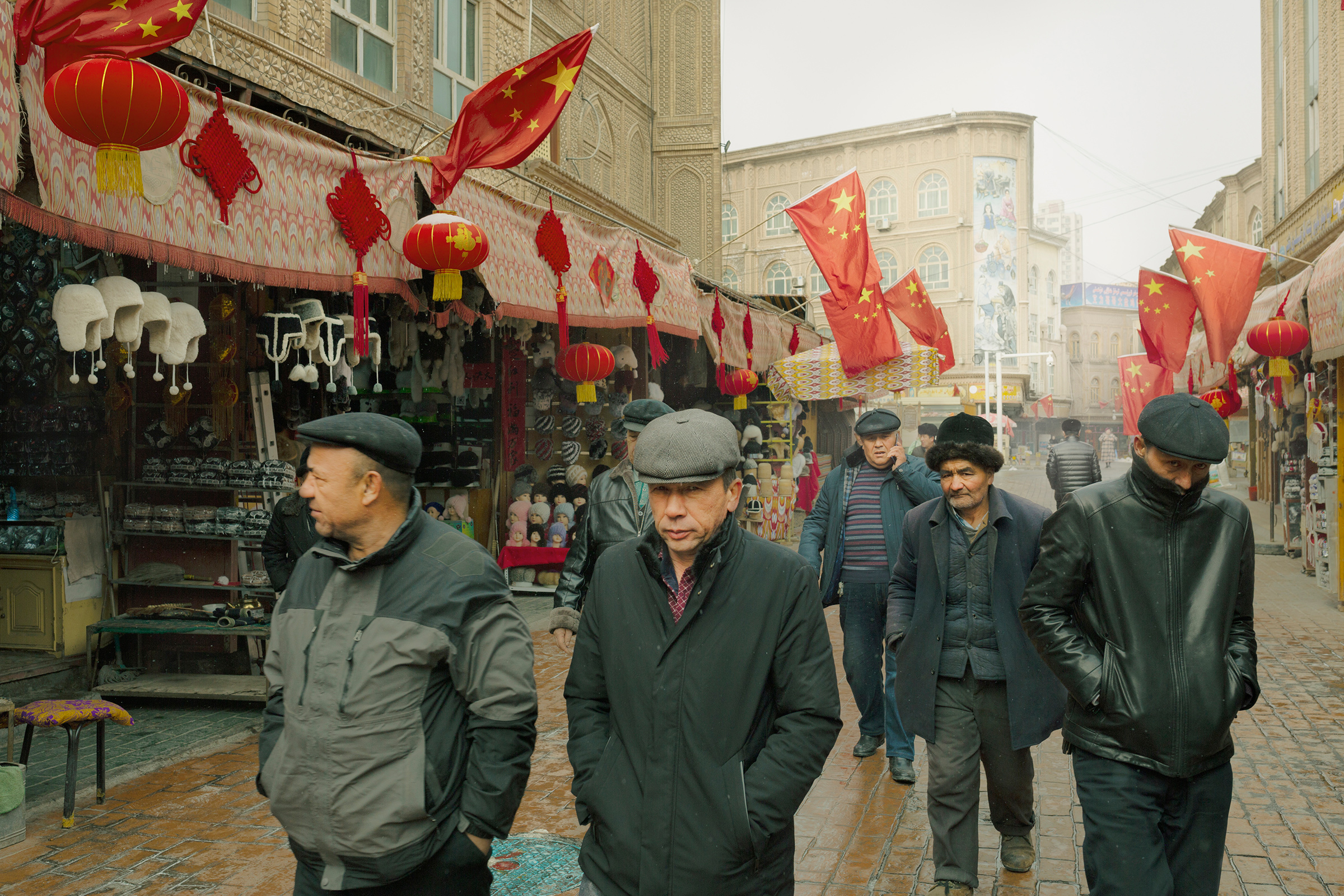 Uighur men strolling through Kashgar, Xinjiang, in January 2019
