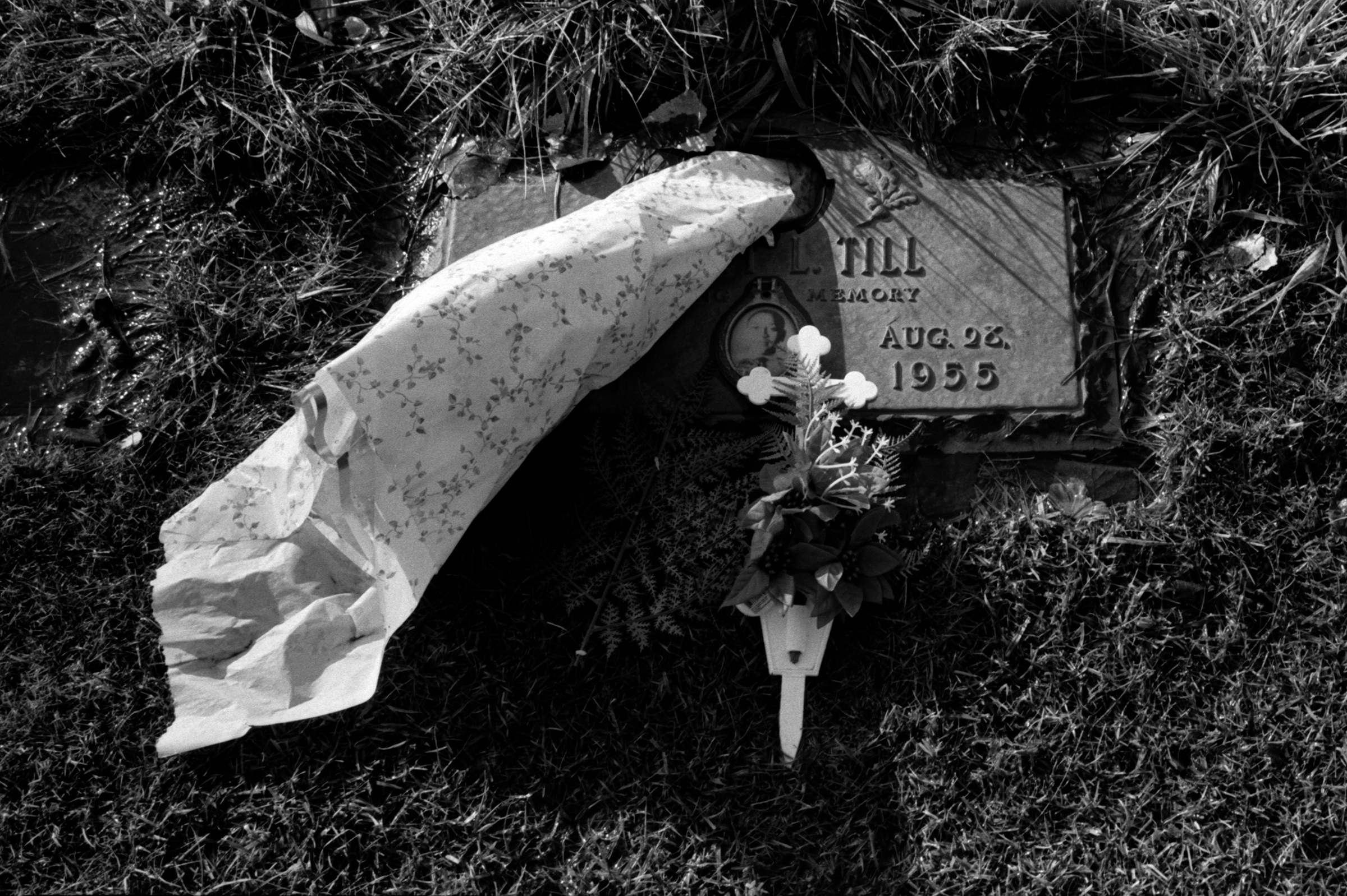 Flowers placed on Emmett Till's gravesite at Burr Oak Cemetery in Aslip, Ill. in 2014