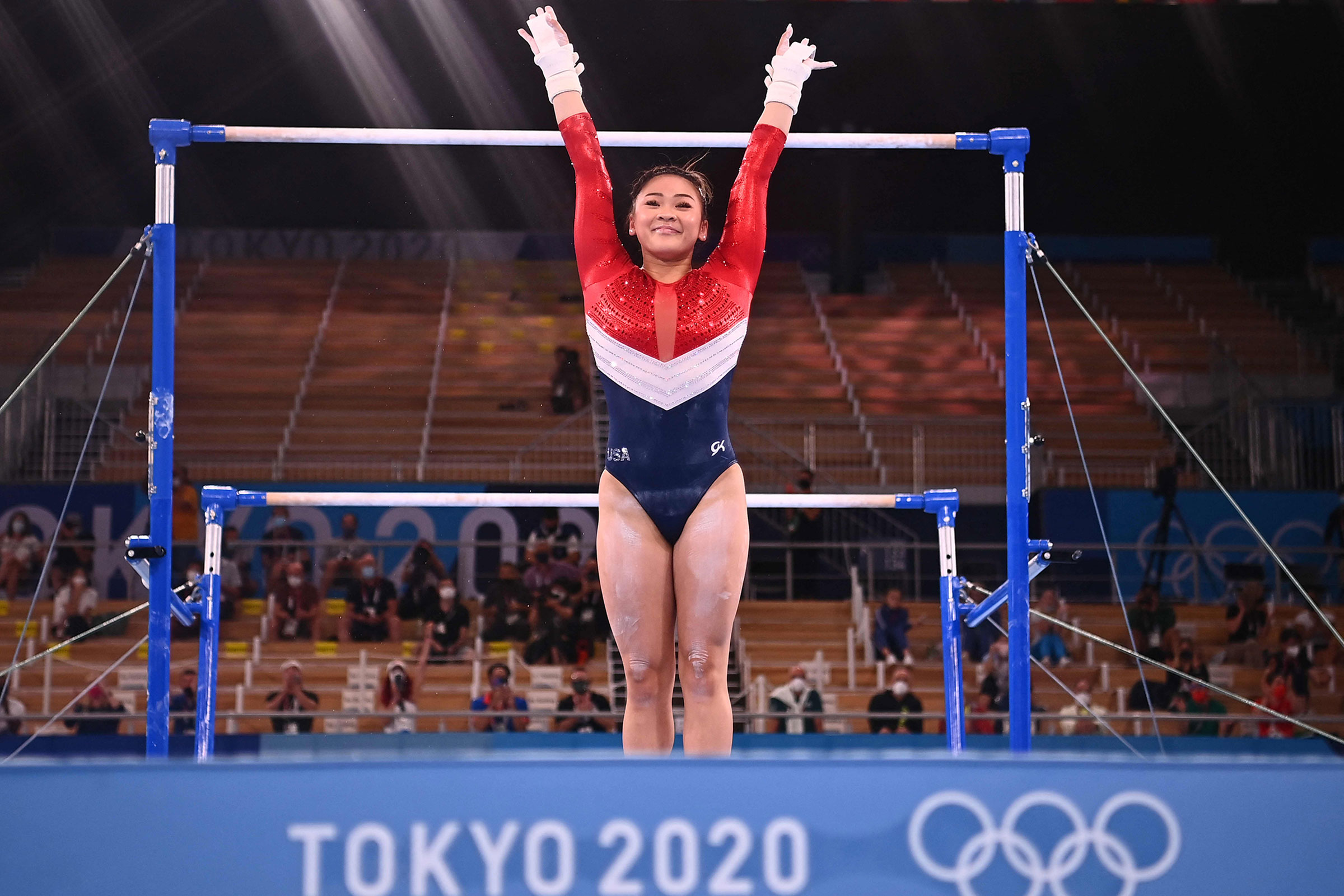 USA's Sunisa Lee reacts after competing in the uneven bars event of the artistic gymnastics women's team final during the Tokyo 2020 Olympic Games at the Ariake Gymnastics Centre in Tokyo on July 27, 2021. (Loic Venance—AFP/Getty Images)
