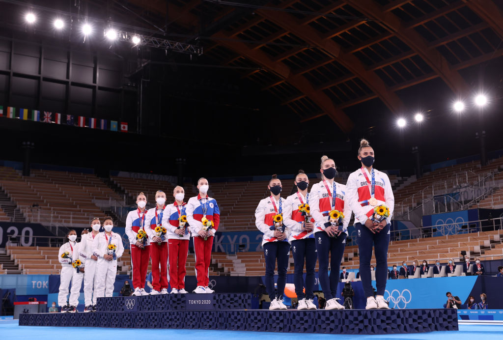 Team USA with Silver, Team ROC with Gold and Great Britain with Bronze during the medal ceremony in the Women's Team Final on day four of the Tokyo 2020 Olympic Games at Ariake Gymnastics Centre on July 27, 2021 in Tokyo, Japan. (Laurence Griffiths—Getty Images)