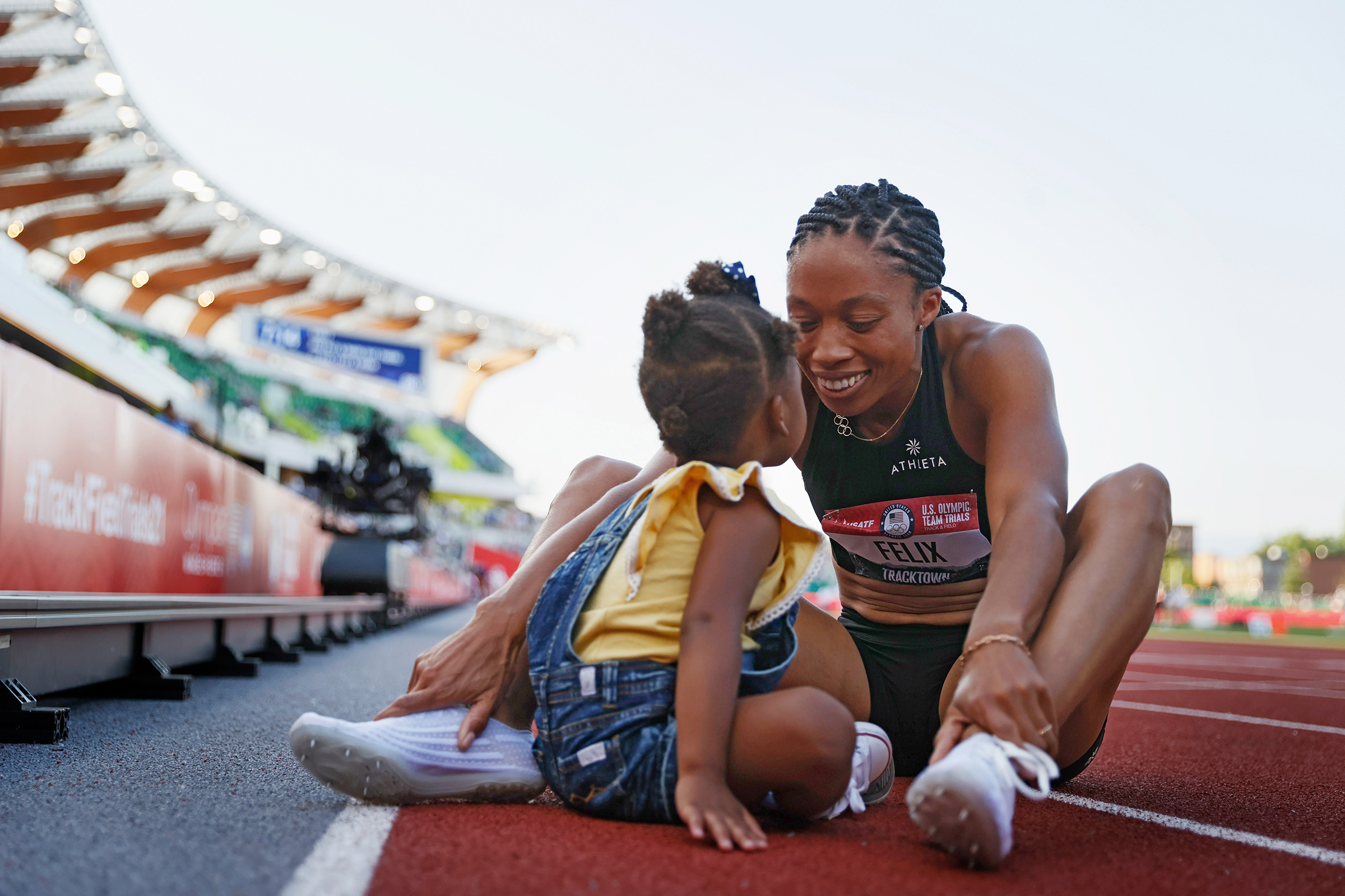 Felix with daughter Camryn at the U.S. track-and-field trials (Steph Chambers—Getty Images)