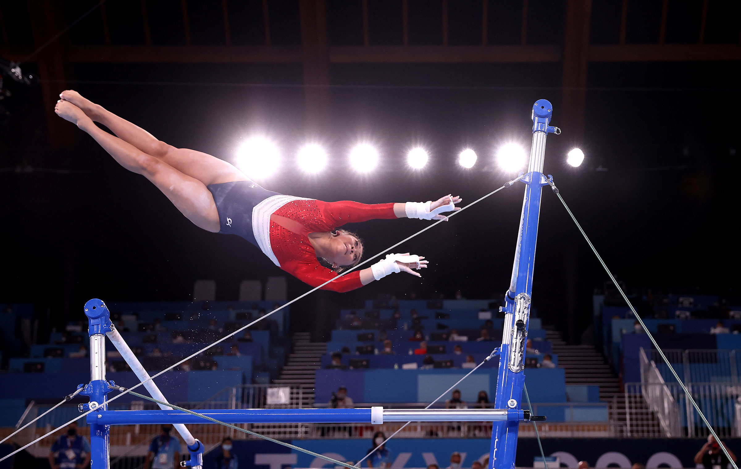 Sunisa Lee of Team United States competes in the uneven bars during the Women's Team Final of the Tokyo 2020 Olympic Games on July 27, 2021.
