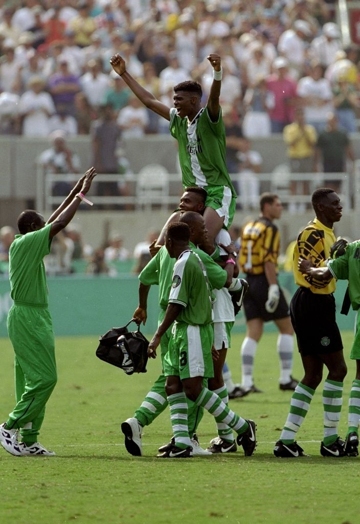 Nigerian Captain Nwankwo Kanu is carried by teammates after their victory in the Men's Soccer Final over Argentina during the Centennial Olympic Games in Atlanta (David Cannon—Allsport/Getty Images)