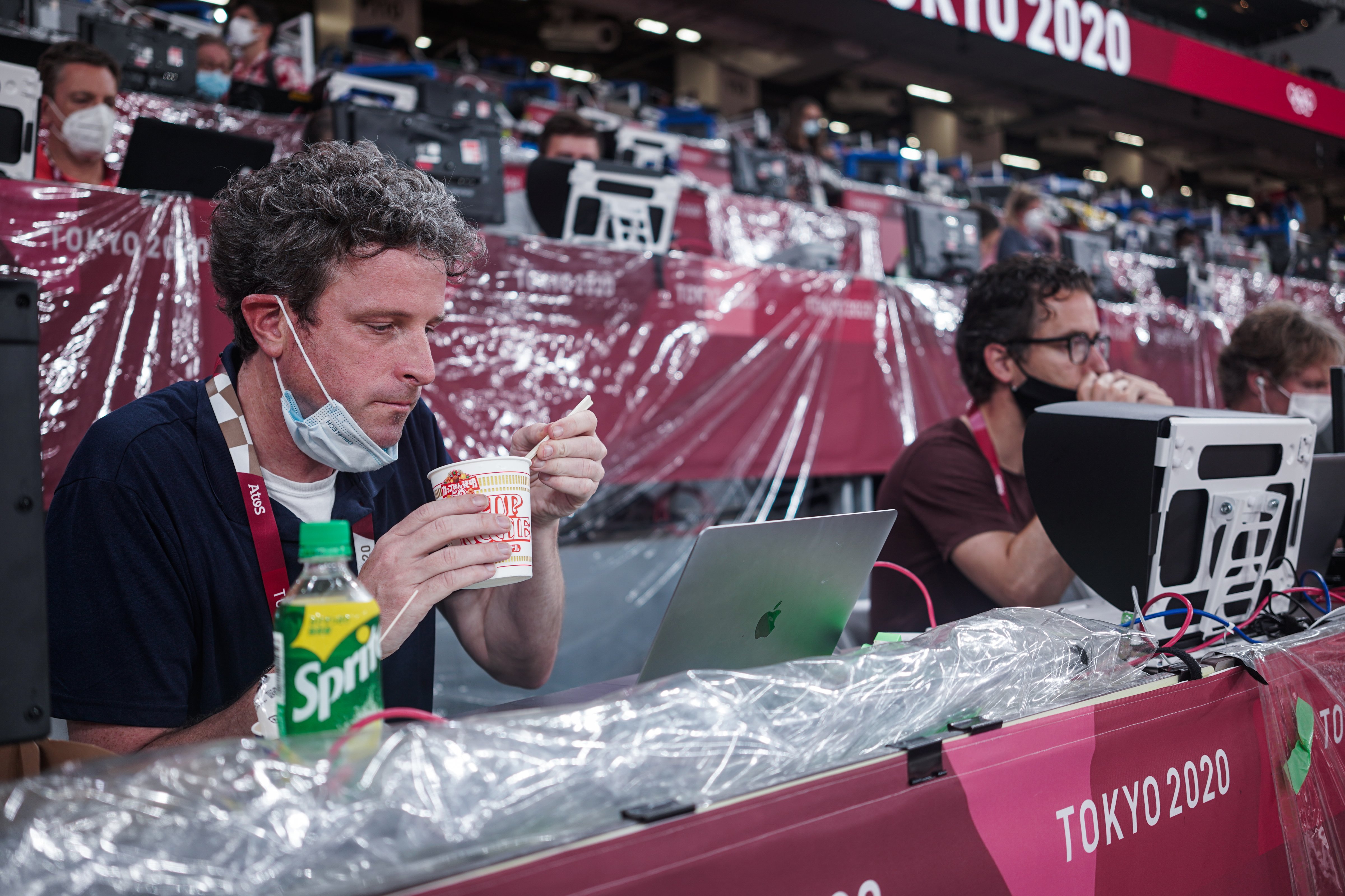 Gregory eating one of his go-to meals while covering track and field in Tokyo (Aria Chen for TIME)