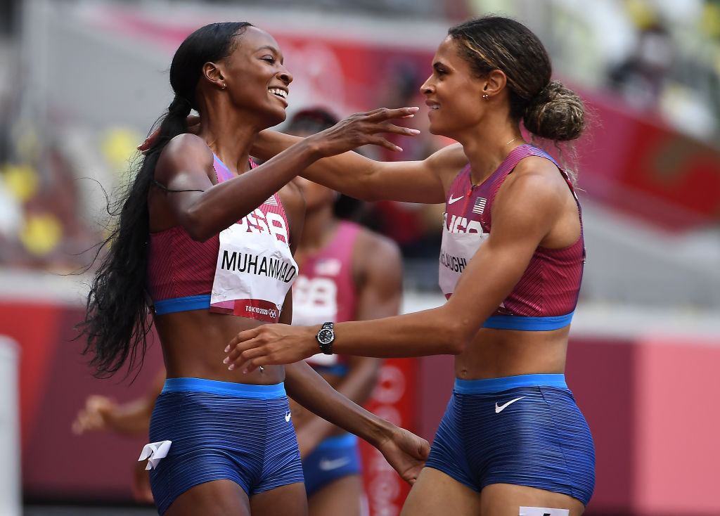 American Sydney McLaughlin, right, celebrates her gold medal with silver medalist and teammate Dalilah Muhammed after the 400m hurdles at the 2020 Tokyo Olympics. (Wally Skalij–Los Angeles Time/Getty Images)