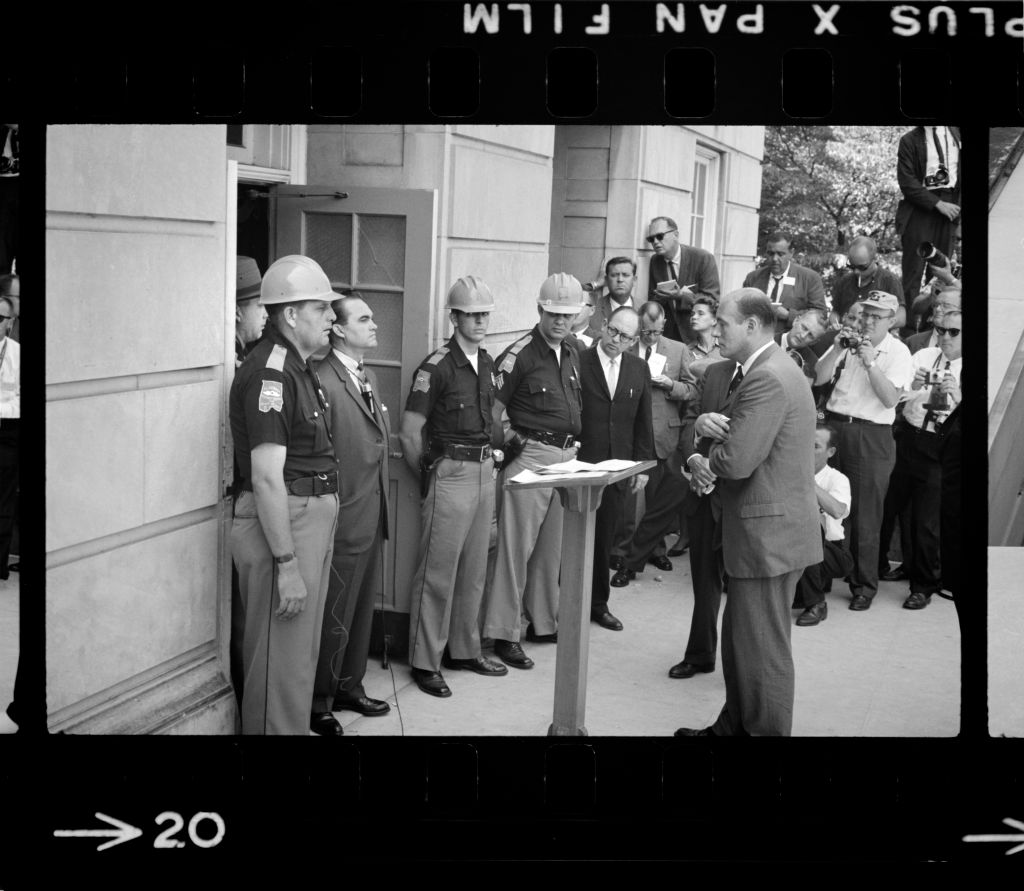 Governor George Wallace attempting to block Integration by standing defiantly at Door while being confronted by Deputy U.S. Attorney General Nicholas Katzenbach, University of Alabama, Tuscaloosa, Alabama, (Warren K. Leffler- Universal History Archive)