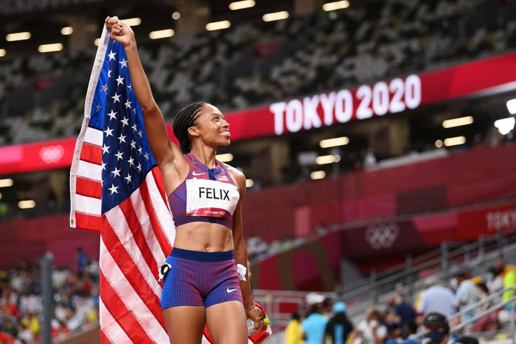 Allyson Felix of Team USA reacts after winning bronze in the women's 400m final on day fourteen of the Tokyo 2020 Olympic Games at Olympic Stadium on August 6, 2021 in Tokyo, Japan .