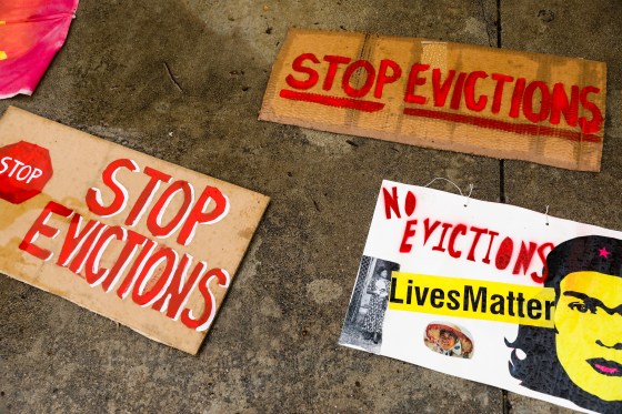 Signage lays on the ground during a protest outside the Santa Clara County Courthouse in San Jose to halt eviction proceedings from taking place on Jan. 27. Although rent moratoriums were instituted to help people who lost their jobs due to coronavirus shutdowns, certain types of eviction actions are still going forward.