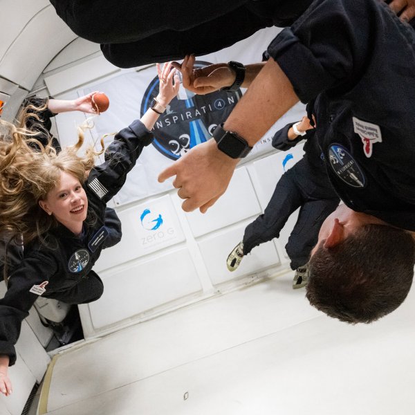 Hayley Arceneaux (left) and the rest of the Inspiration4 crew on a ZERO-G flight in Las Vegas on July 11, 2021. The plane flies in parabolic arcs to simulate zero gravity.