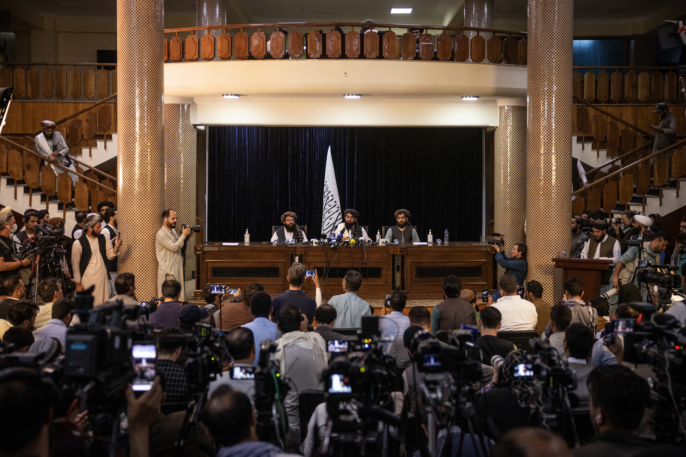 Zabihullah Mujahid, the Taliban's spokesperson, addresses reporters on Aug. 17 during the group's first news conference since gaining control of Kabul.