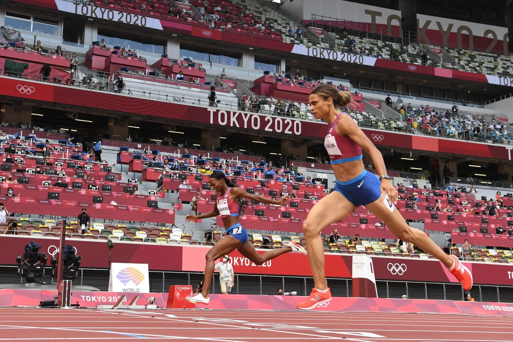Team USA's Sydney Mclaughlin wins the women's 40-0m hurdles final ahead of Teaam USA's Dalilah Muhammad setting a new world record during the Tokyo 2020 Olympic Games at the Olympic Stadium in Tokyo on Aug. 4, 2021. (Jewel Samad—AFP via Getty Images)