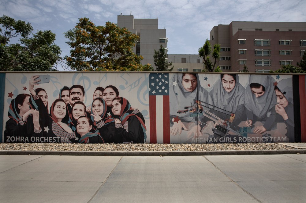 Murals are seen along the walls at a quiet U.S. embassy in Kabul on July 30, 2021. In August, as the Taliban approached, staffers at the embassy scrambled to leave.