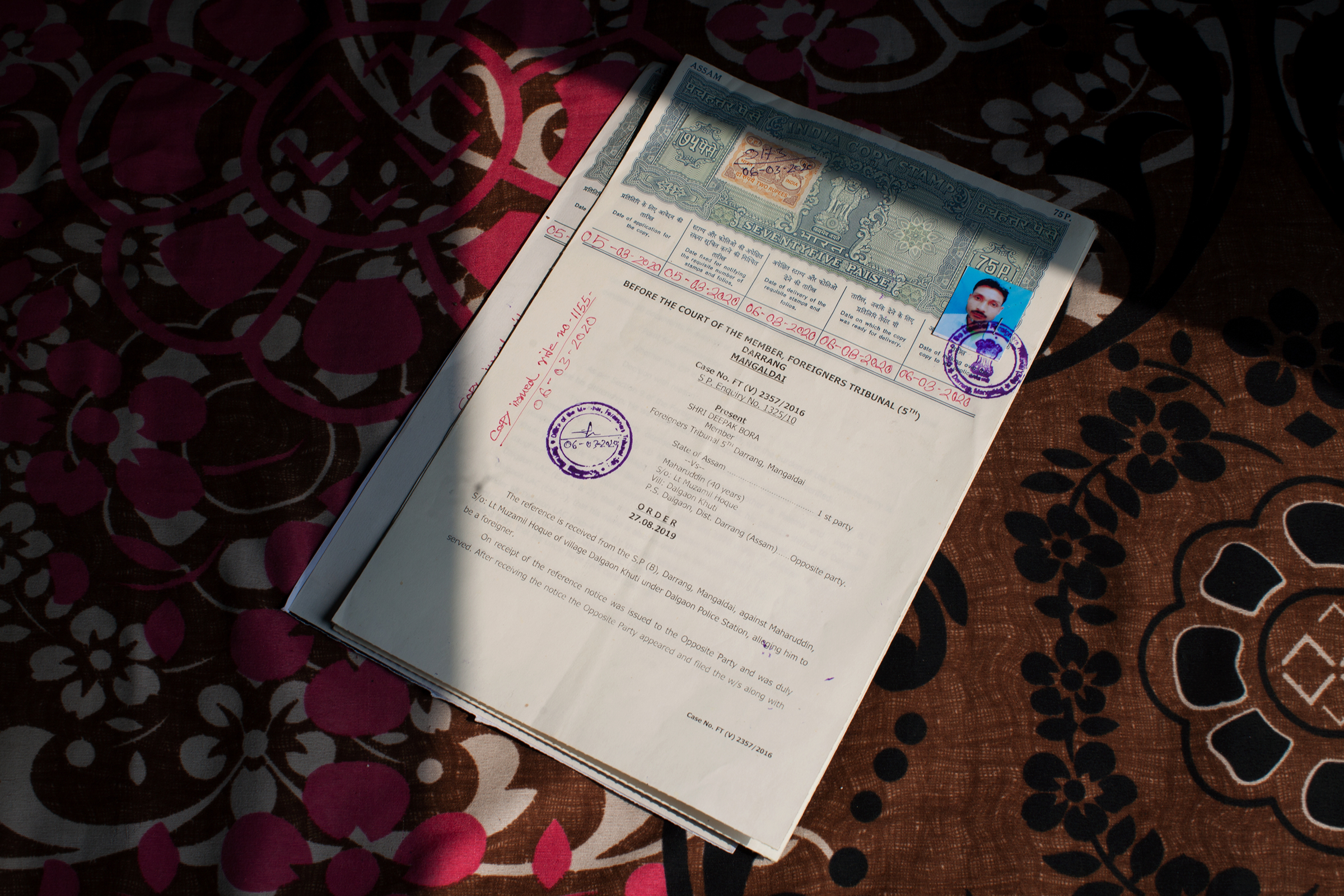 An order from a foreigners tribunal, a quasi-judicial body unique to Assam, declaring Mahuruddin a foreigner.