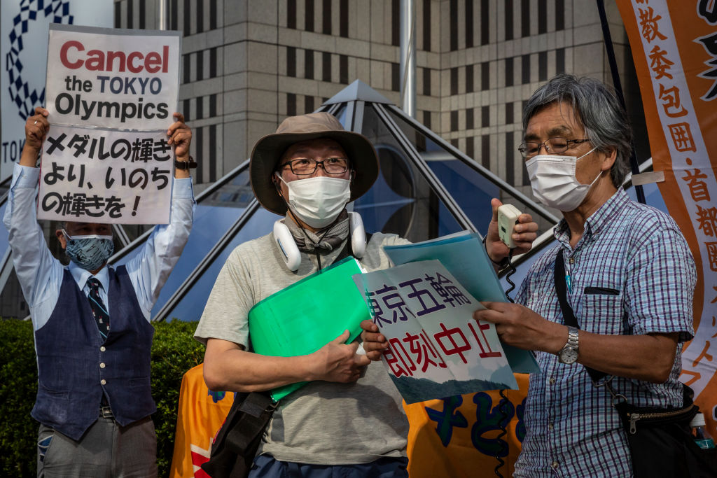 Anti-Olympics protesters demonstrate against the Tokyo Olympic in front of the Tokyo Metropolitan government building in Tokyo, Japan on August 05, 2021. (Yuichi Yamazaki—Getty Images)
