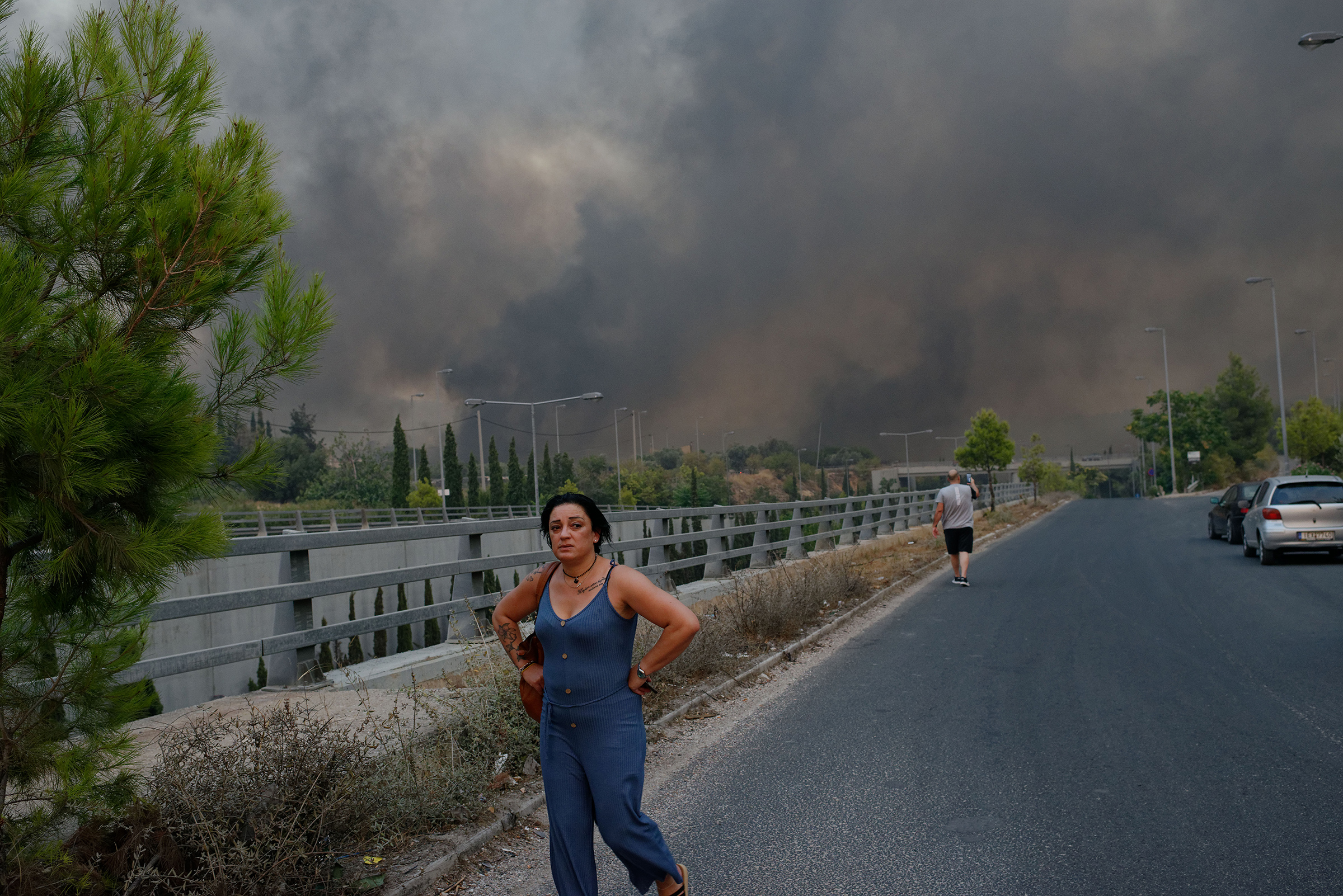 Forest fire rages in Varybobi, north of Athens, Greece on Aug. 3. Residential areas in Athens northern suburbs were evacuated as wildfires reached the outskirts of the city. (Gerasimos Koilakos—NurPhoto/Getty Images)