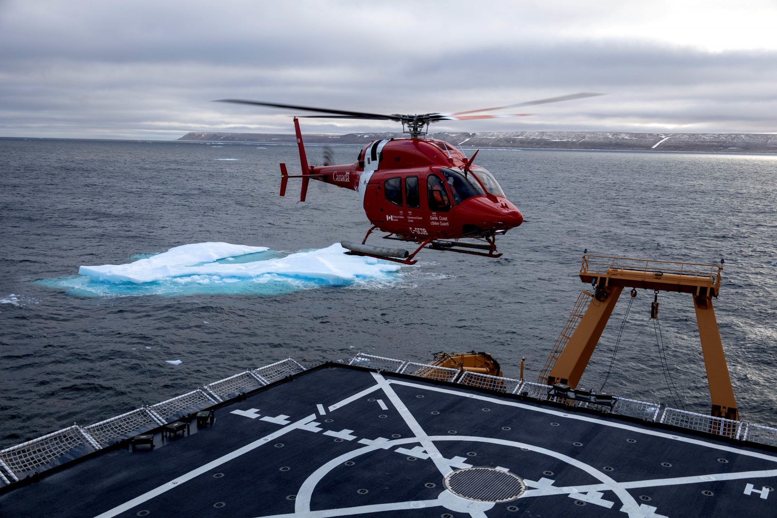 A Canadian coast guard helicopter lands aboard the U.S. Coast Guard Cutter Healy near Resolute, Nunavut, Canada on Sept. 6, 2021. (Petty Officer First Class Michael Underwood—U.S. Coast Guard)