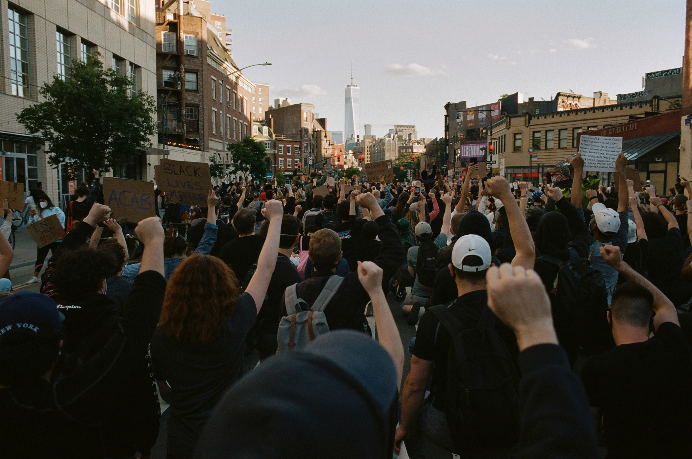 Black Lives Matter protesters take a knee while looking south down 7th Avenue toward One World Trade Center, June 4, 2020. (Daniel Arnold)