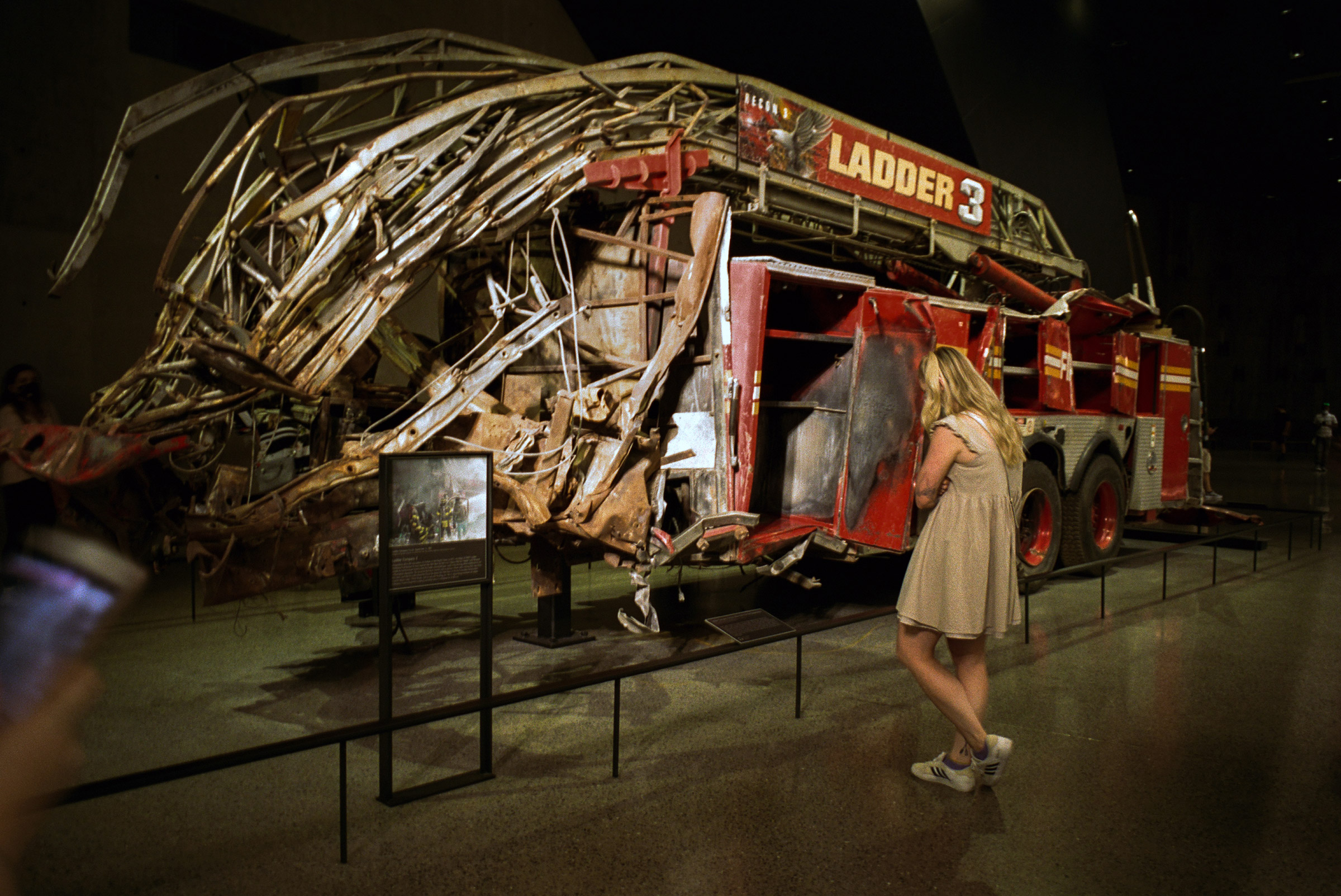 New York, NY - 9/5/21 - A mangled firetruck gives visceral resonance to the easily reawakened wound commemorated at the 9/11 museum.