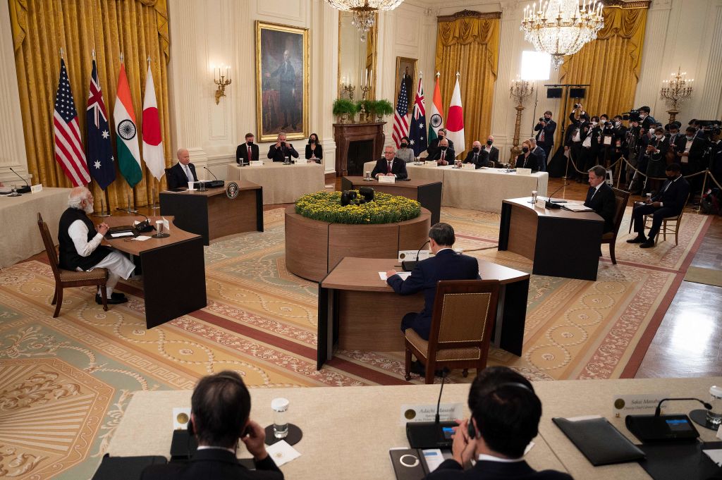 US President Joe Biden (2L), Indian Prime Minister Narendra Modi (L), Japanese Prime Minister Suga Yoshihide (C) and Australian Prime Minister Scott Morrison (Top C) sit down for the the first-ever in-person Quad Leaders Summit at the White House in Washington, DC on September 24, 2021. (JIM WATSON/AFP via Getty Images)