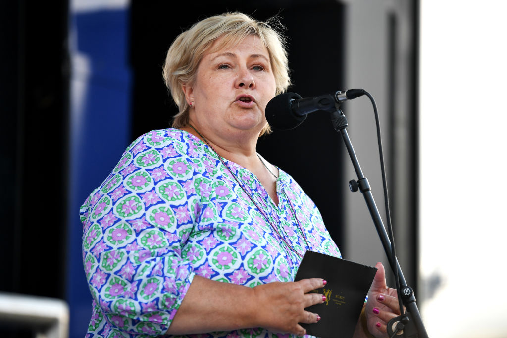 MALSELV, NORWAY - AUGUST 07: Erna Solberg, Prime Minister of Norway, speaks at podium ceremony on August 07, 2021 in Malselv, Norway. (Stuart Franklin — Getty Images)