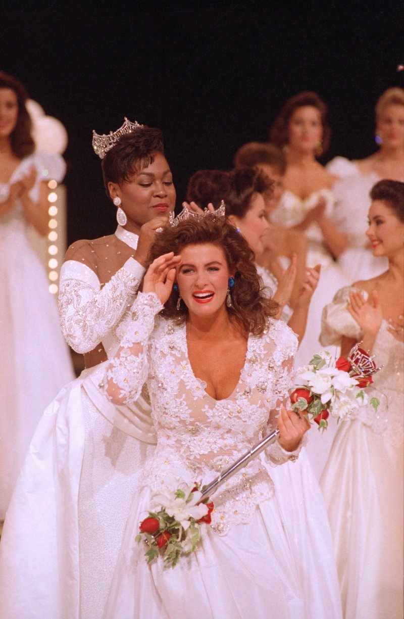 Miss America 1992, Carolyn Sapp of Hawaii, is crowned by former Miss America Marjorie Judith Vincent on Sept. 14, 1991.