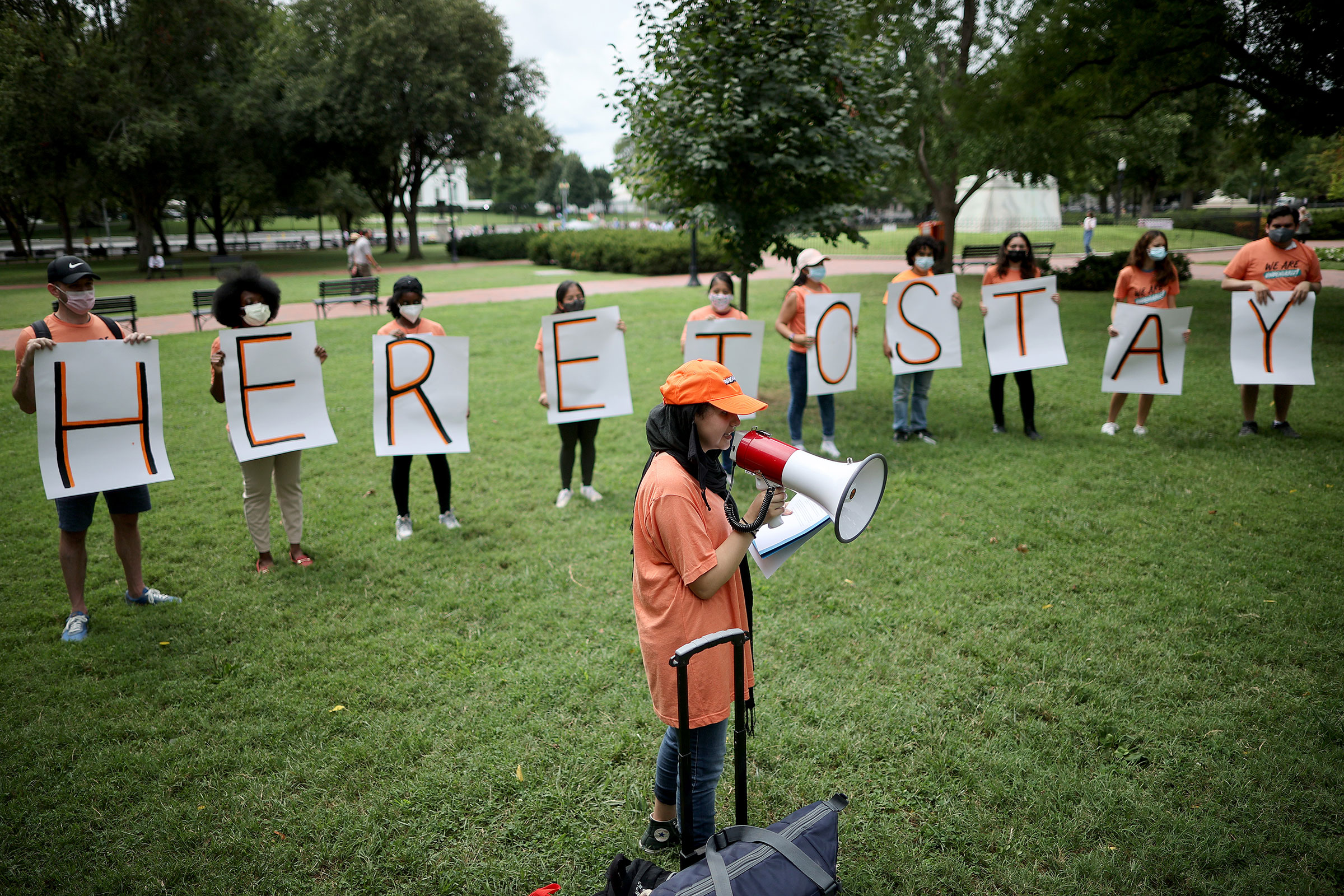 Activists demand that Congress and the Biden Administration create a path for citizenship for millions of immigrants while rallying in Lafayette Park across from the White House on Aug. 17, 2021. (Chip Somodevilla—Getty Images)
