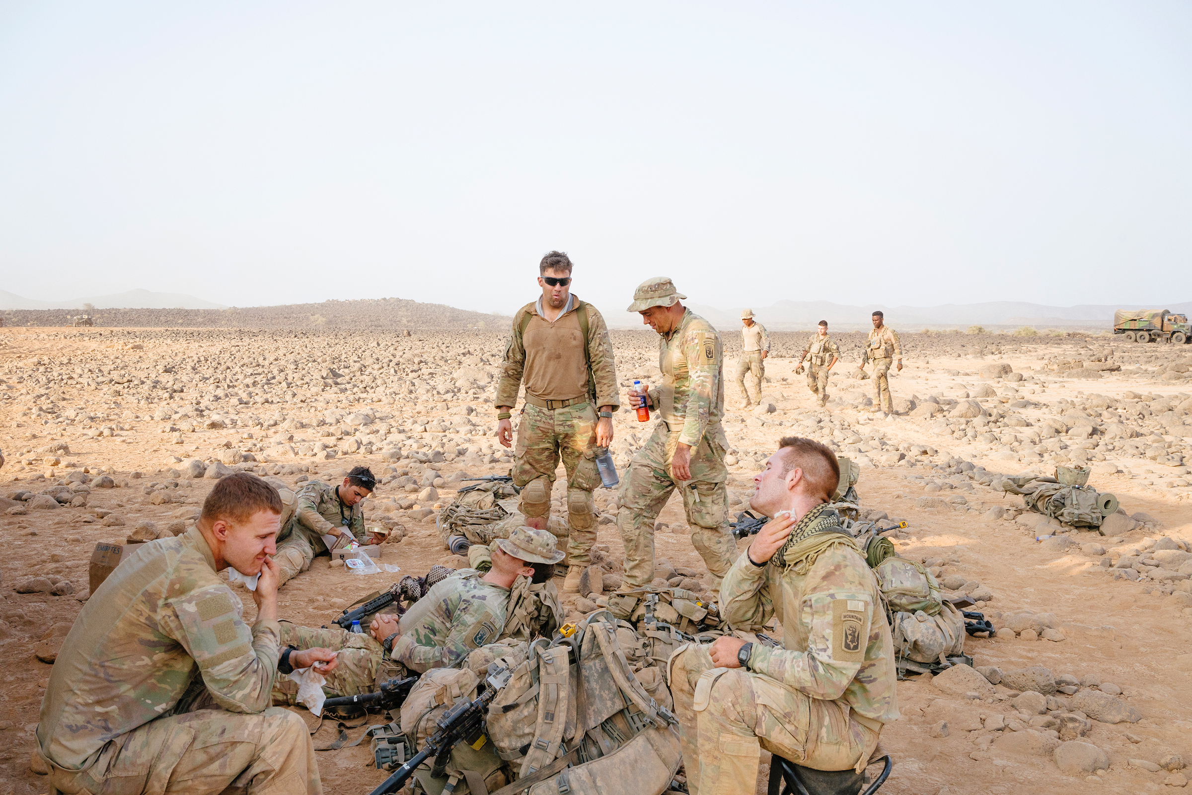 Soldiers take a break during desert training. (Emanuele Satolli for TIME)