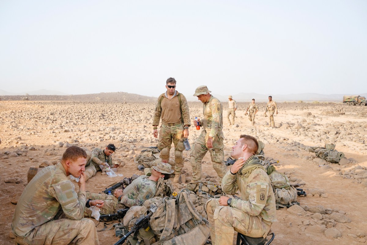 Soldiers take a break during desert training.
