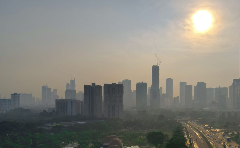 This aerial photo taken on June 13 2021 shows buildings amid smog in Jakarta. (Bay Ismoyo— AFP/Getty Images)