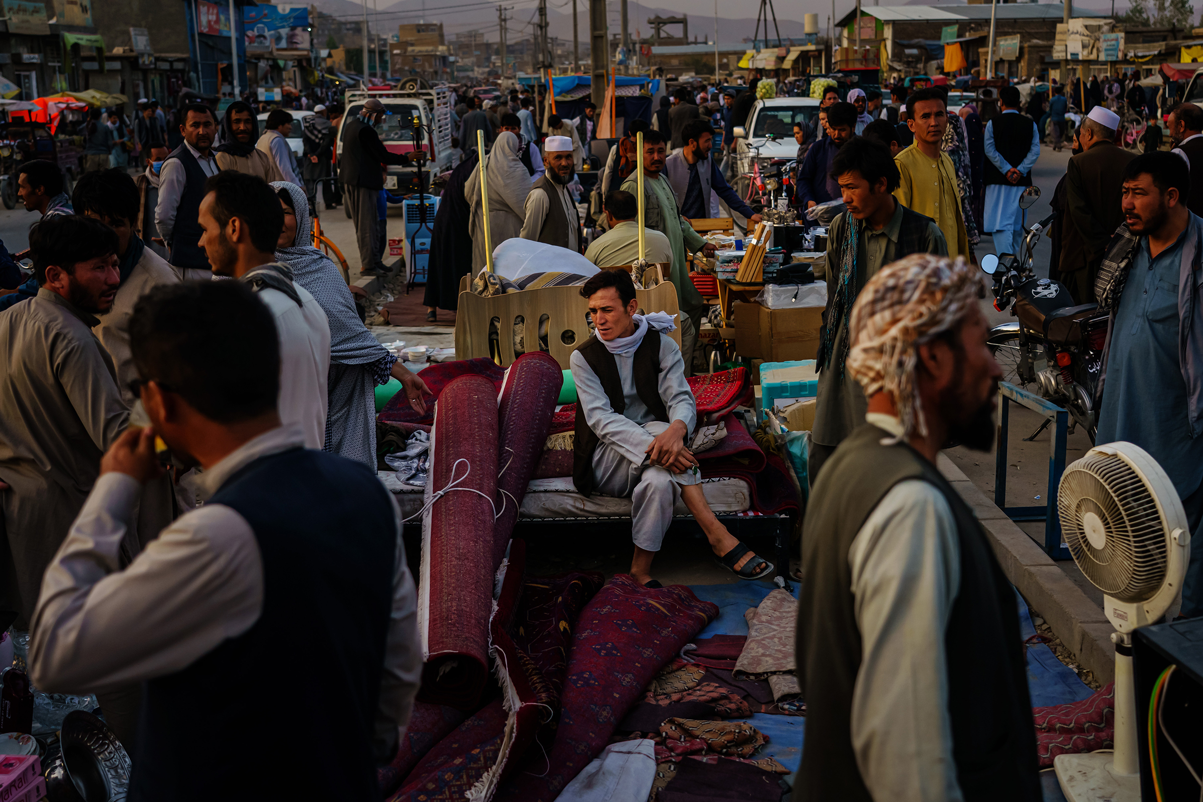 Afghans sell their personal belongings to raise money, citing unemployment, starvation and needing funds to leave the country, in Kabul on Sept. 20, 2021. (Marcus Yam—Los Angeles Times/Getty Images)