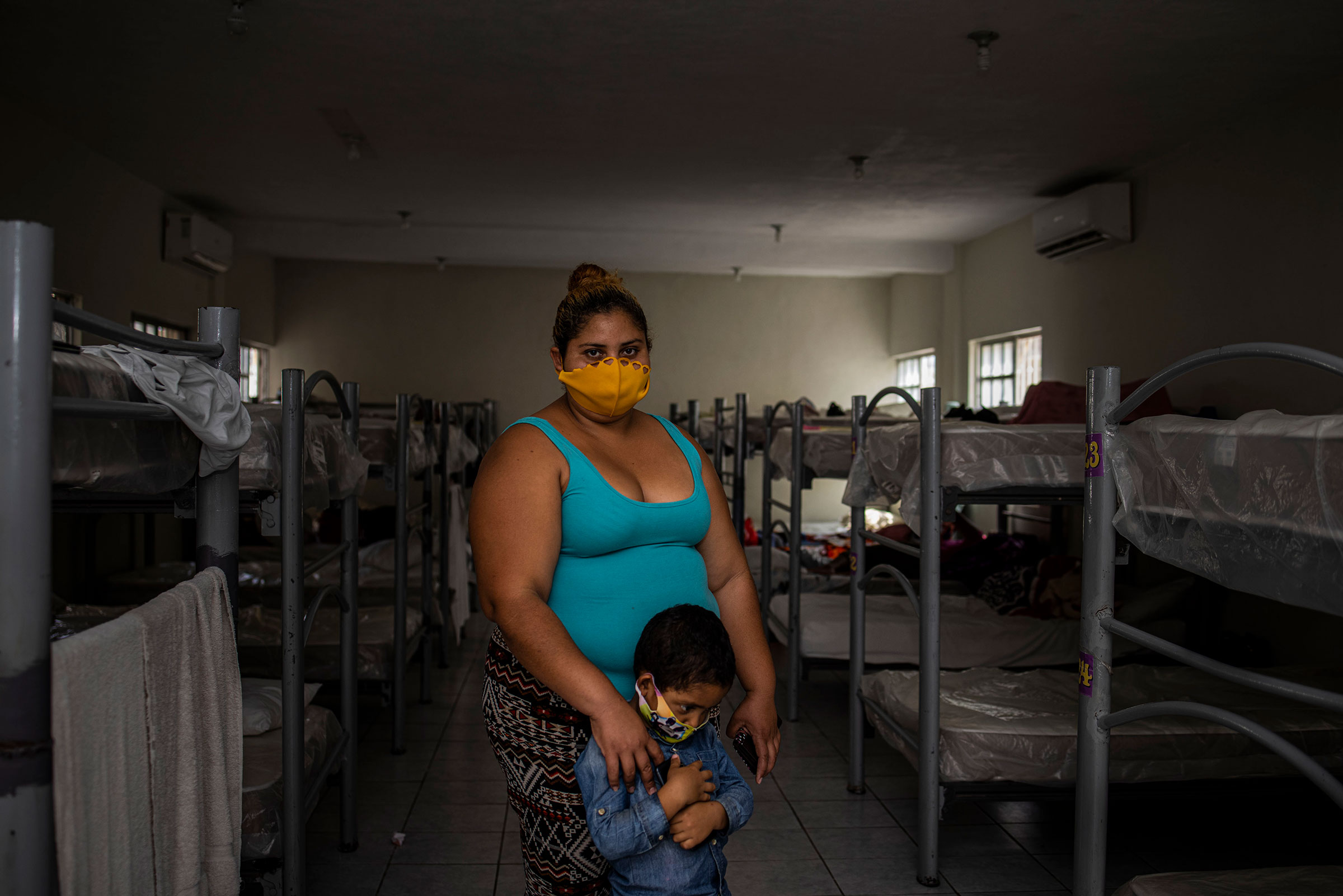 Cyndy Caceres, 28, and her four-year-old son pose for a portrait on May 4, 2021 in Reynosa in the Mexican state of Tamaulipas, a city across the border from McAllen, Texas, that has seen thousands of migrants arrive hoping to claim asylum in the U.S. (Yael Martinez—Magnum Photos for TIME)