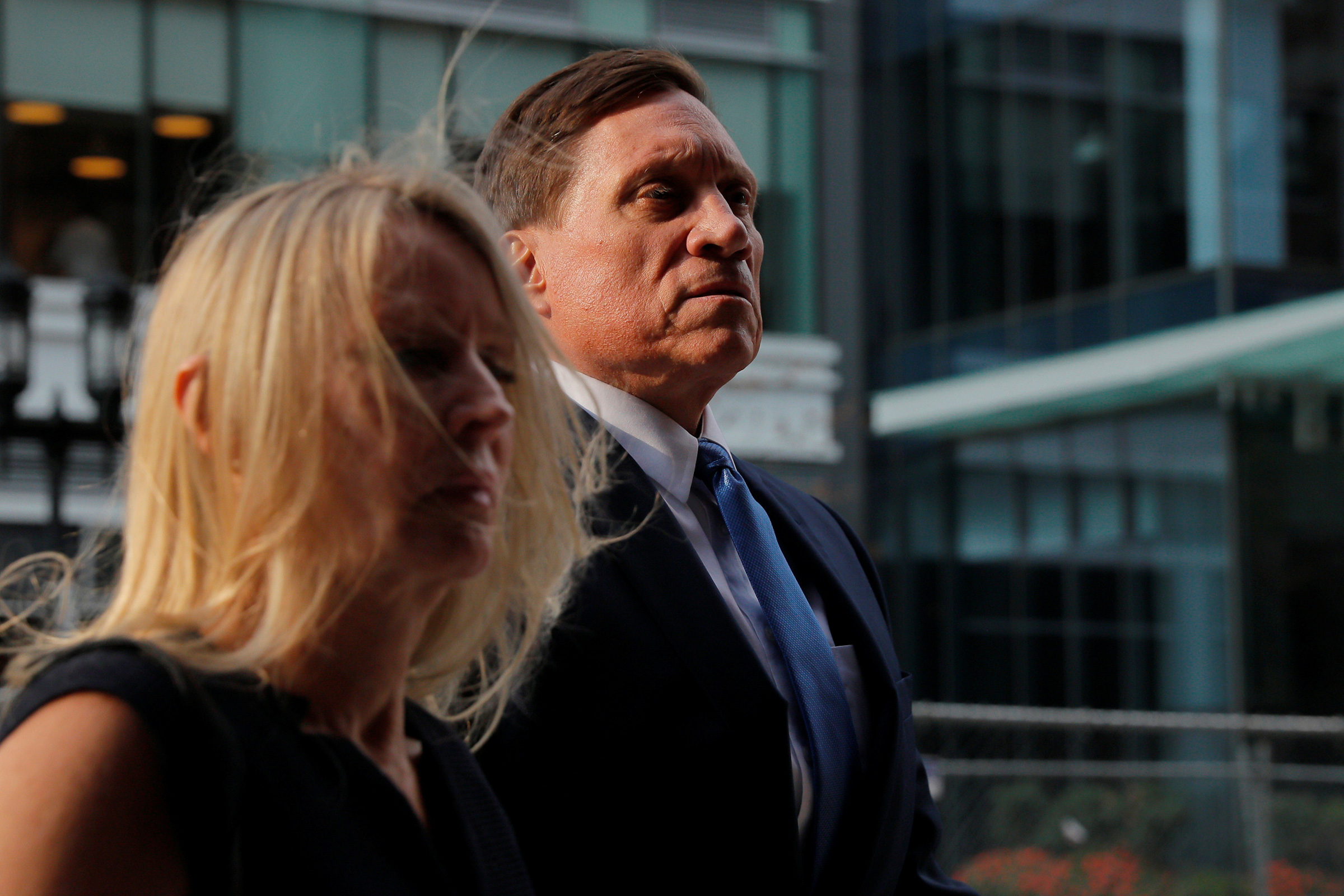 Private equity firm founder John Wilson, charged with participating in a scheme to pay bribes to fraudulently secure the admission of his children to top schools, arrives at federal court for the first day of jury selection in the first trial to result from the U.S. college admissions scandal, which has resulted in dozens of celebrities, executives and coaches facing criminal charges, in Boston, Massachusetts, U.S., September 8, 2021. (Brian Snyder—Reuters)