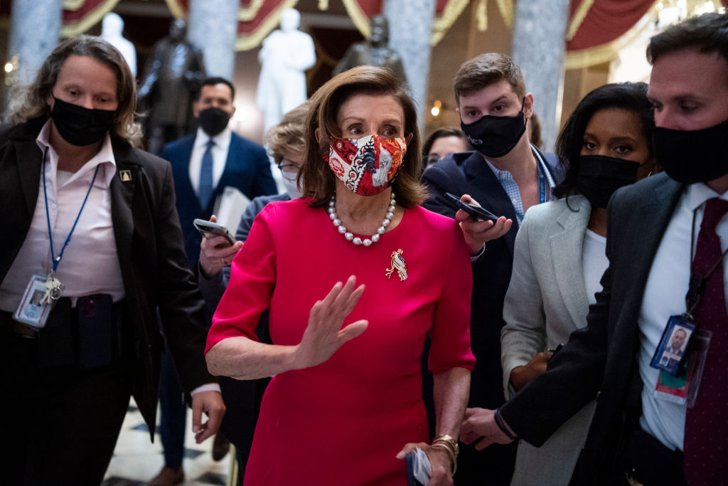 Speaker of the House Nancy Pelosi, D-Calif., talks with reporters after a rally to promote climate benefits in the Build Back Better Act in the U.S. Capitol on Tuesday, September 28, 2021. (Tom Williams/CQ-Roll Call, Inc—Getty Images)